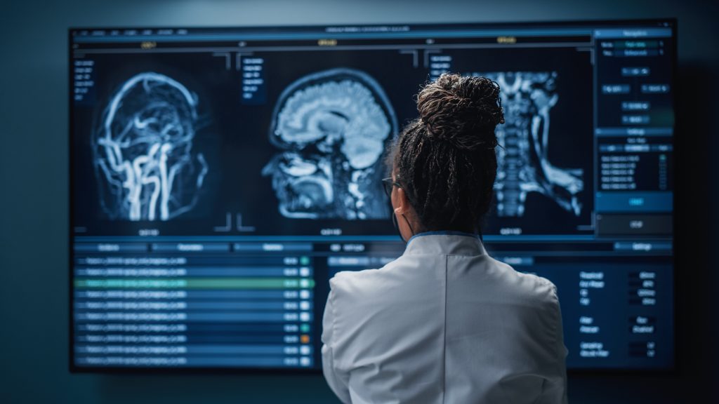Woman looking at radiology images
